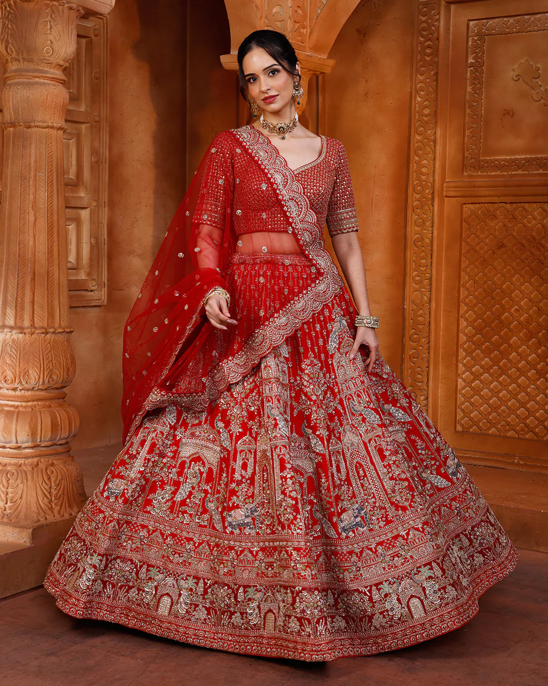 Regal Red Bridal Lehenga With Majestic Peacock & Jharokha Motifs