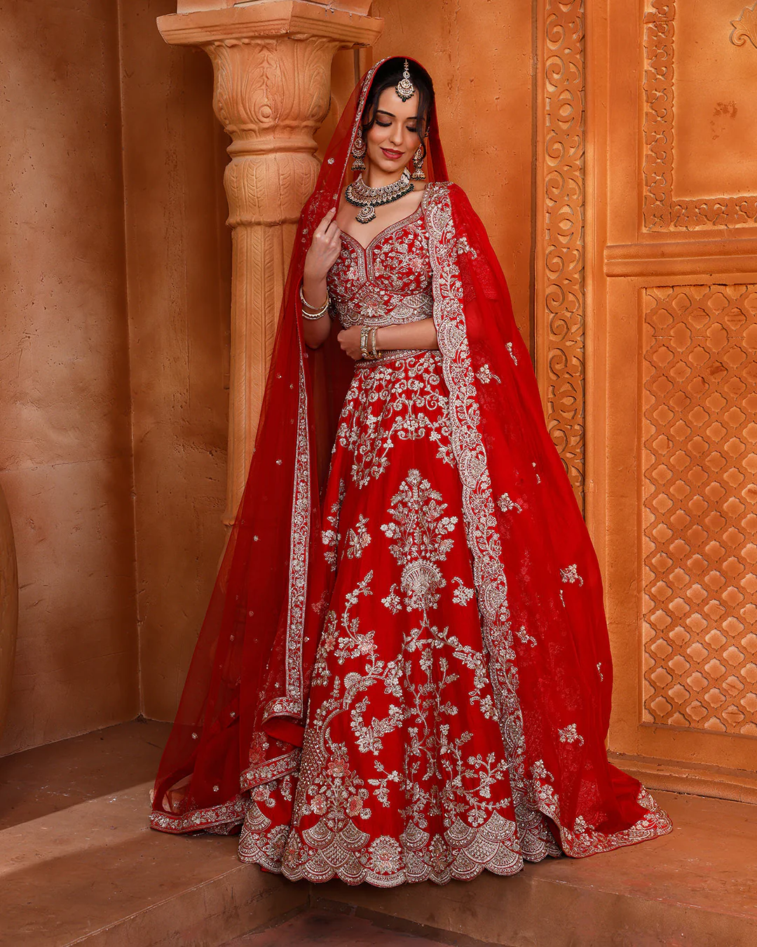 Vibrant Red Embroidered bridal Lehenga In Pure Silk - Image 2